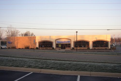 Goodwill store exterior, one-story brick and stucco building.