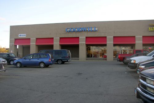Goodwill store exterior, one-story brick building in a shopping center