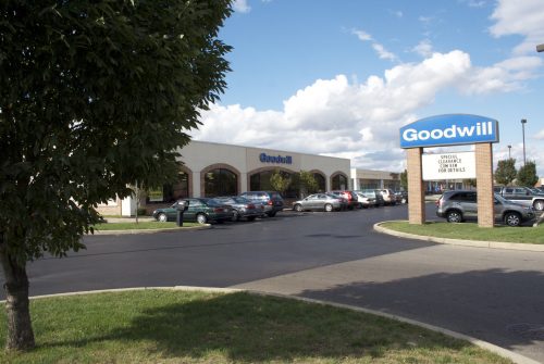 Goodwill store exterior, one-story brick and stucco building